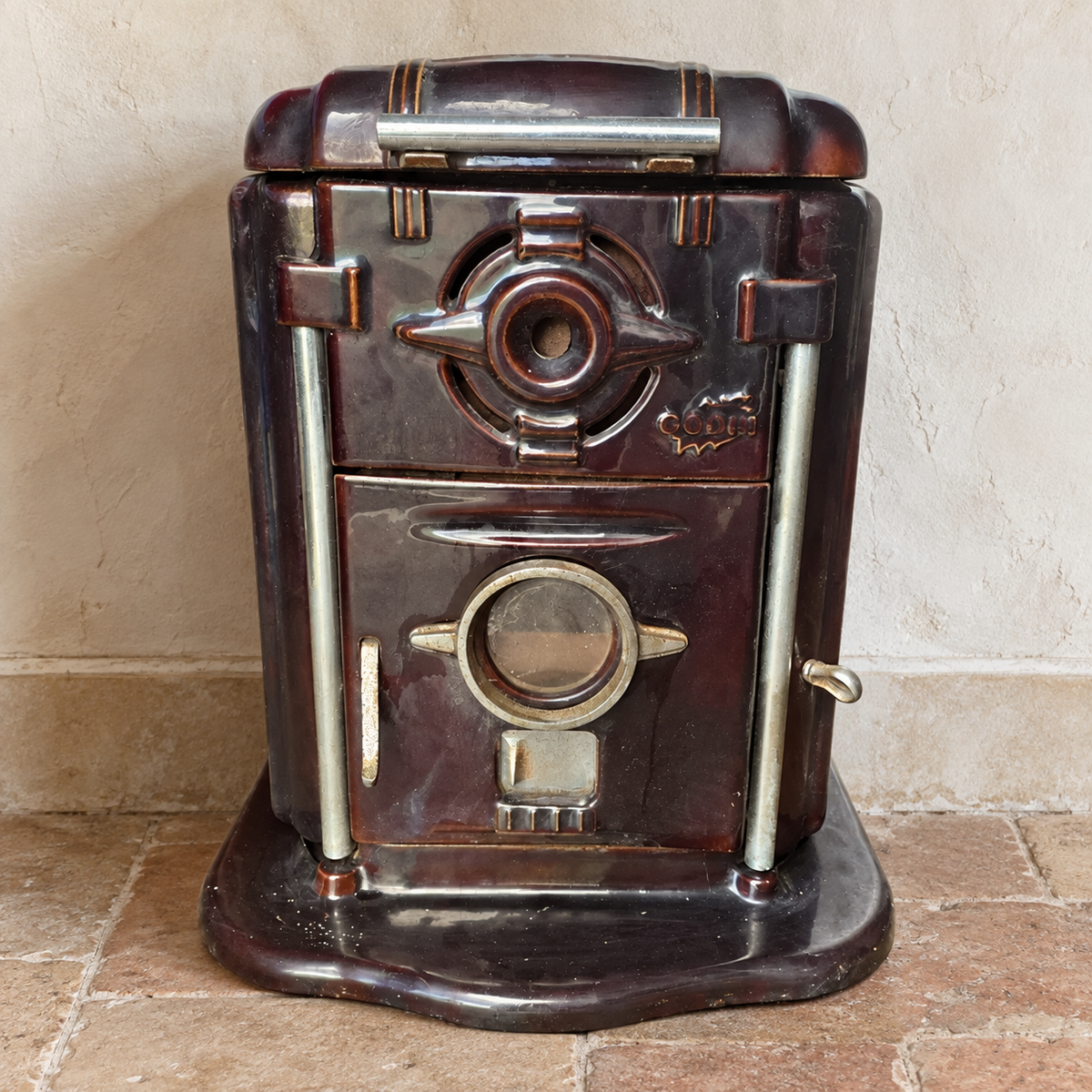 Ancien poêle Godin Art déco en fonte émaillée brun aubergine