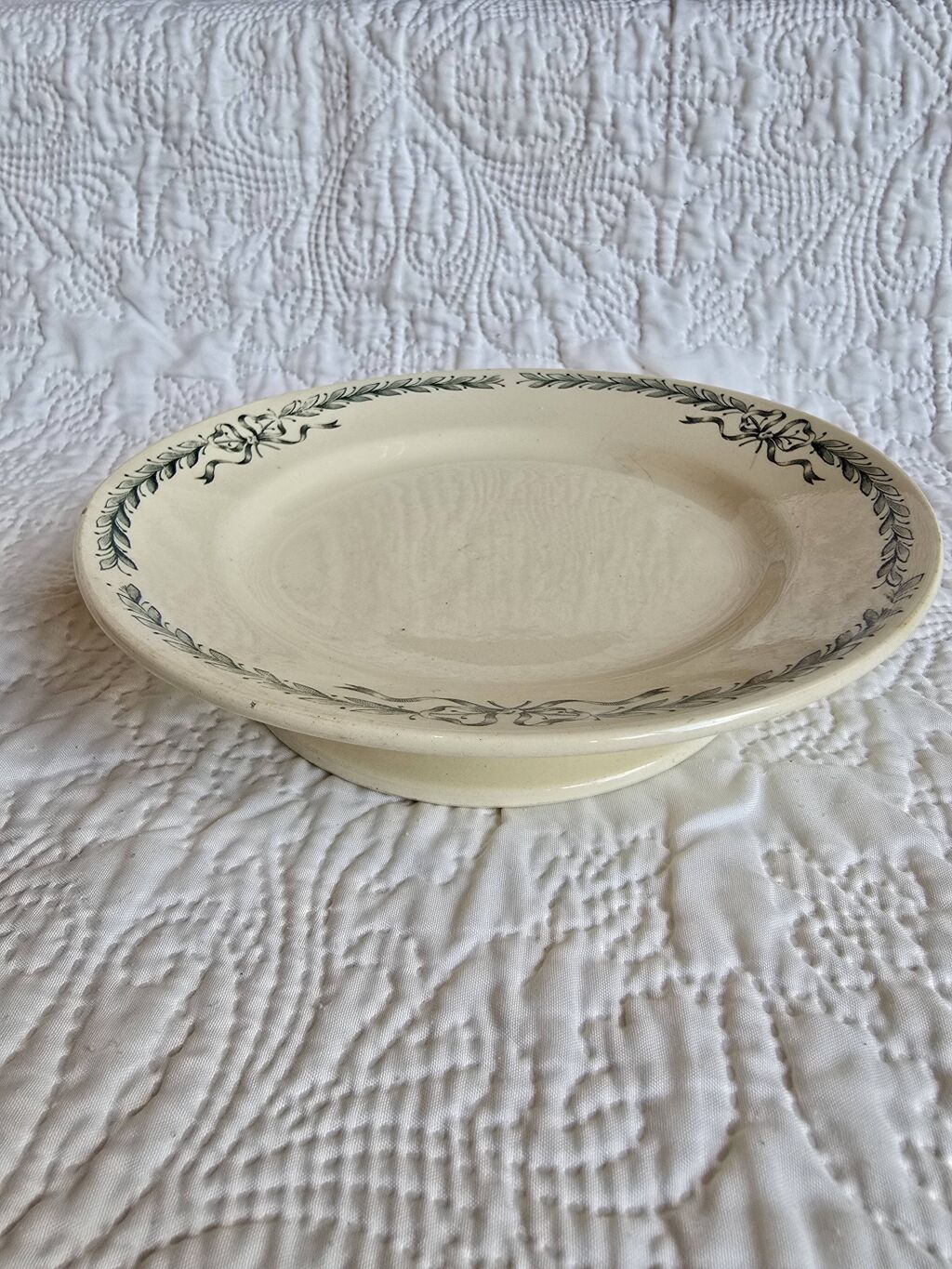 Plat ovale ancien Longchamp modèle Bulle – faïence décor guirlande verte